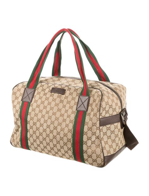 gucci stretchable canvas duffle bag|Gucci duffle bag used.